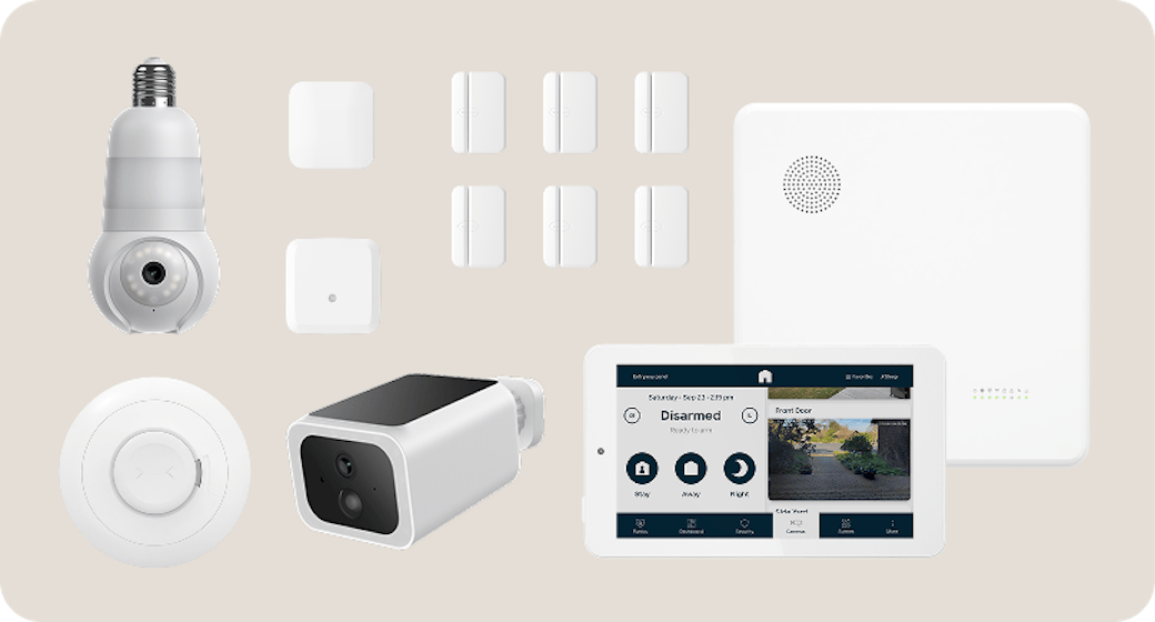 The full Cove security kit: touchscreen panel, hub, door and window sensors, key fob, and yard sign
