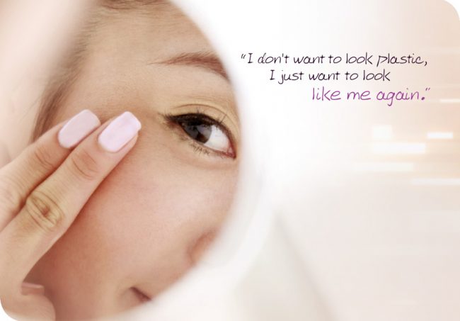 Woman with her hand on her face