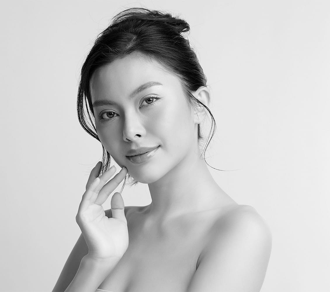 Woman with her hand on her face