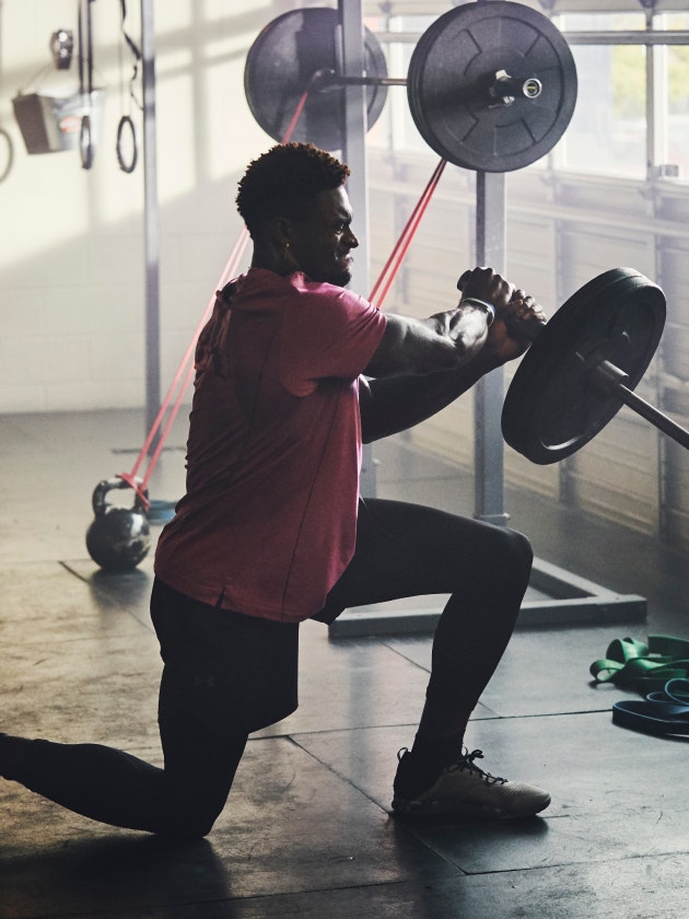 DK Metcalf lifting weights in the gym