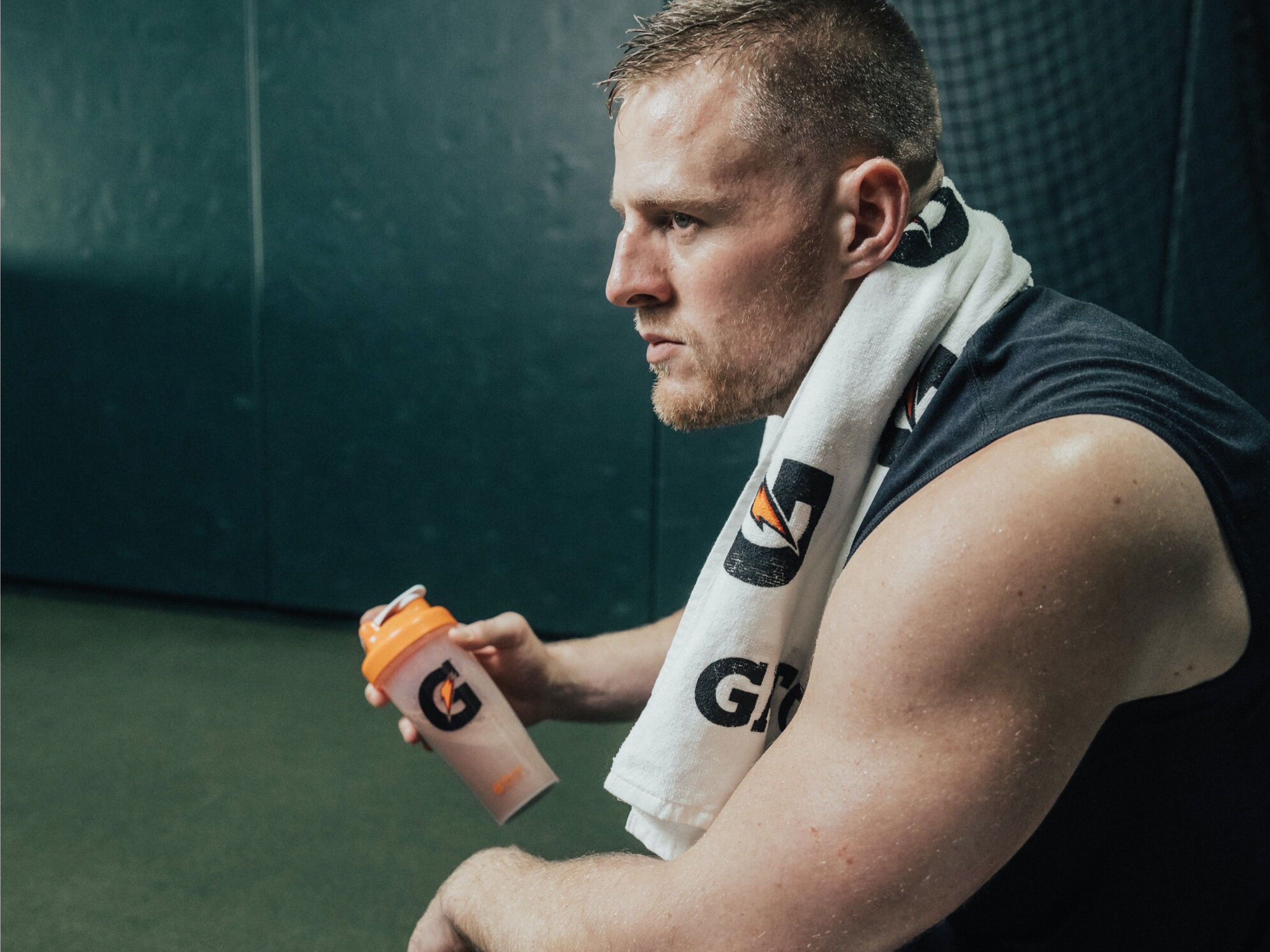 JJ Watt with shaker bottle and towel