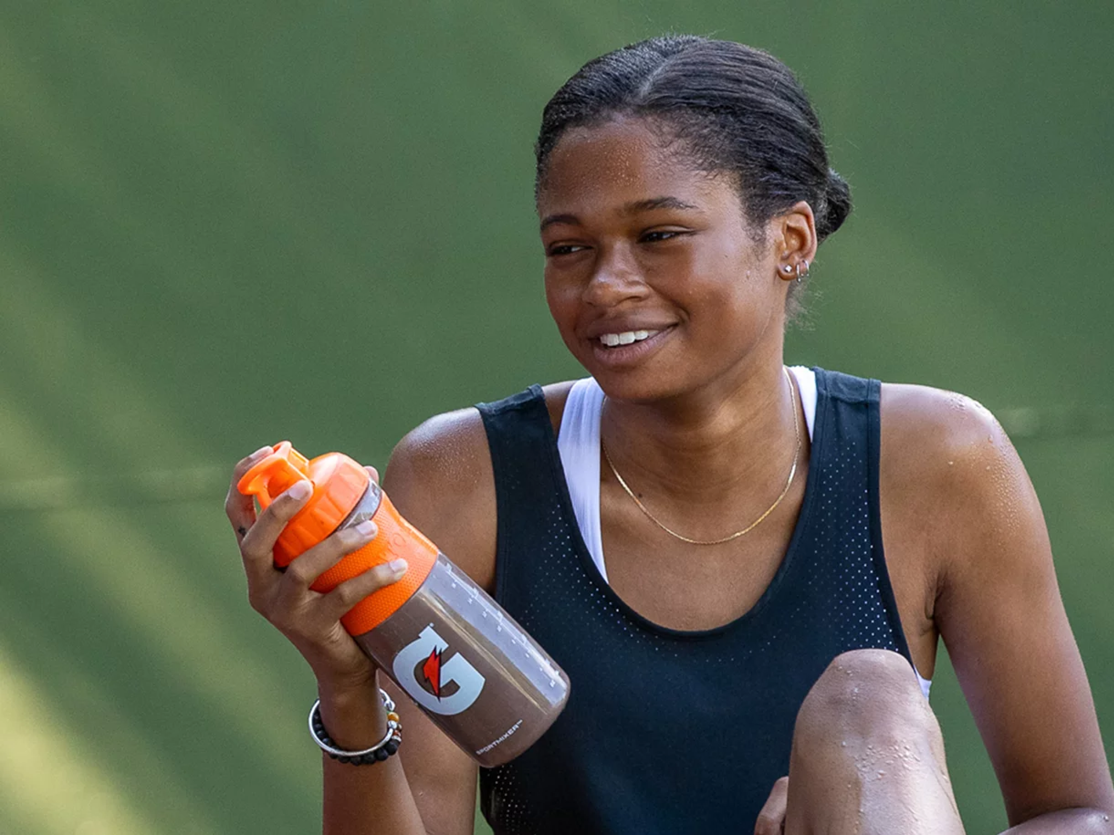 Athlete with premium shaker bottle