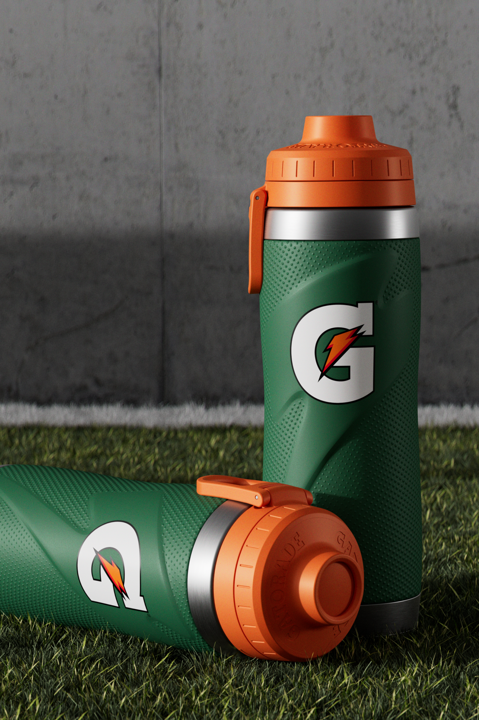 Green stainless steel bottles on turf