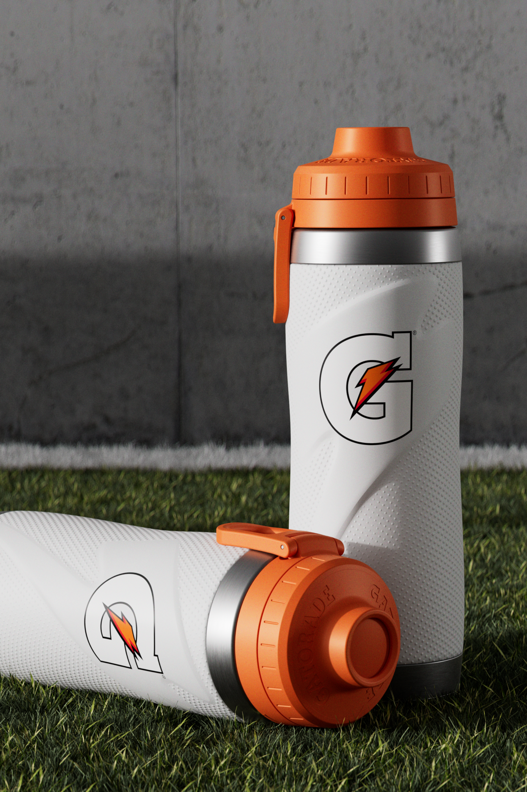 White stainless steel bottles on turf