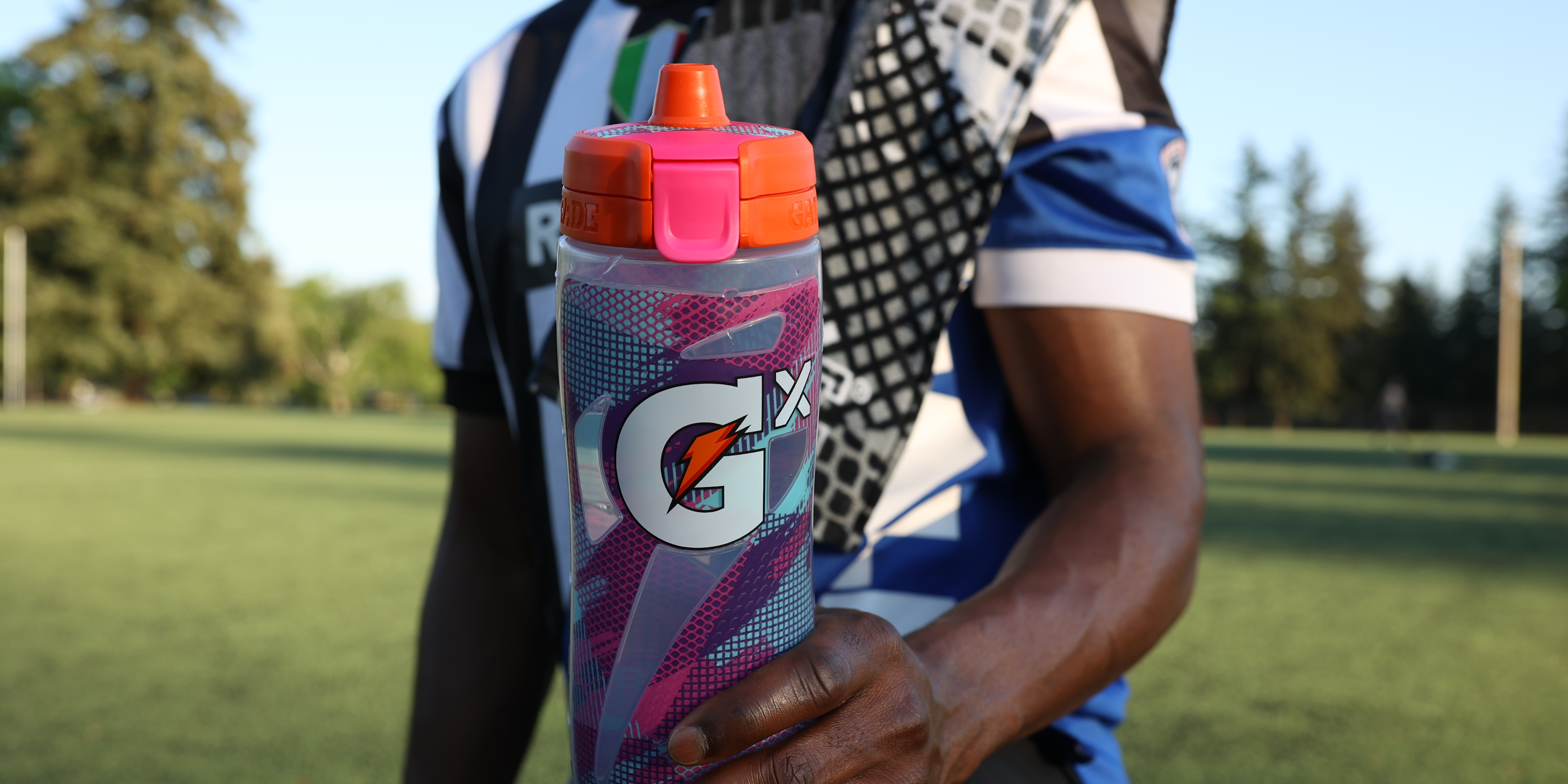 Athlete with limited edition Gx bottle