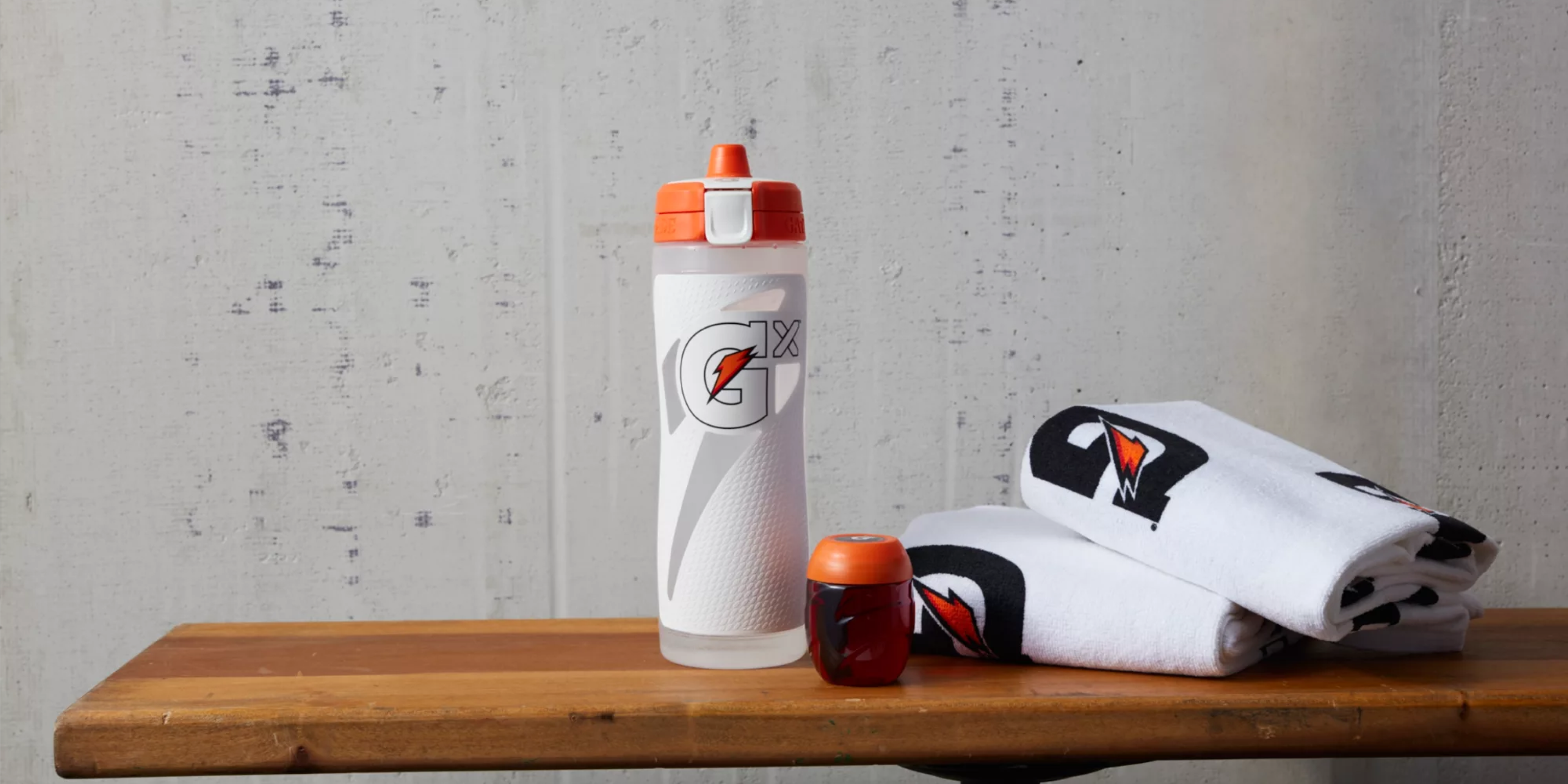 White NBA bottle with pod and Gx towel