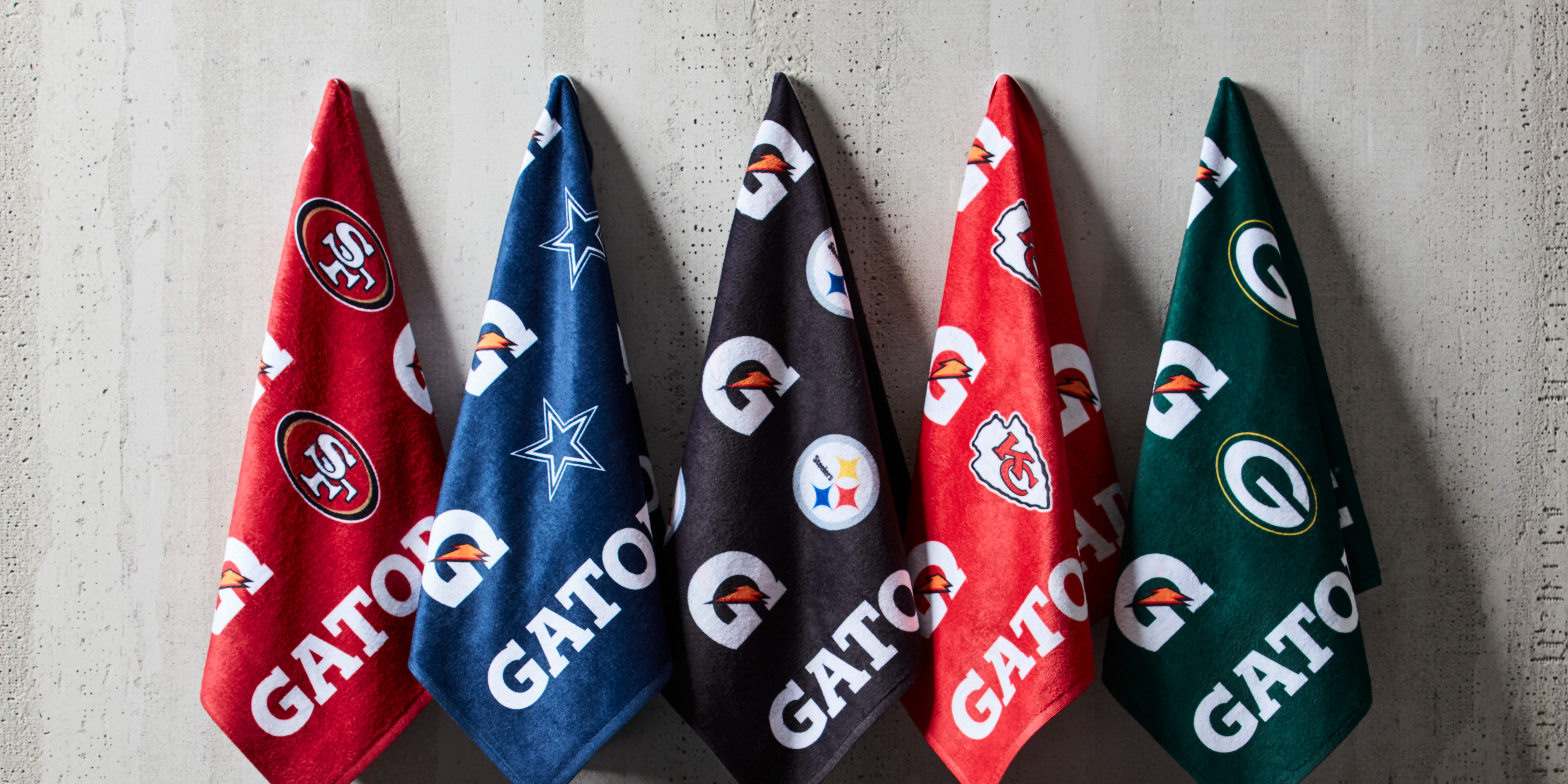 NFL Pro Towels hanging on a wall