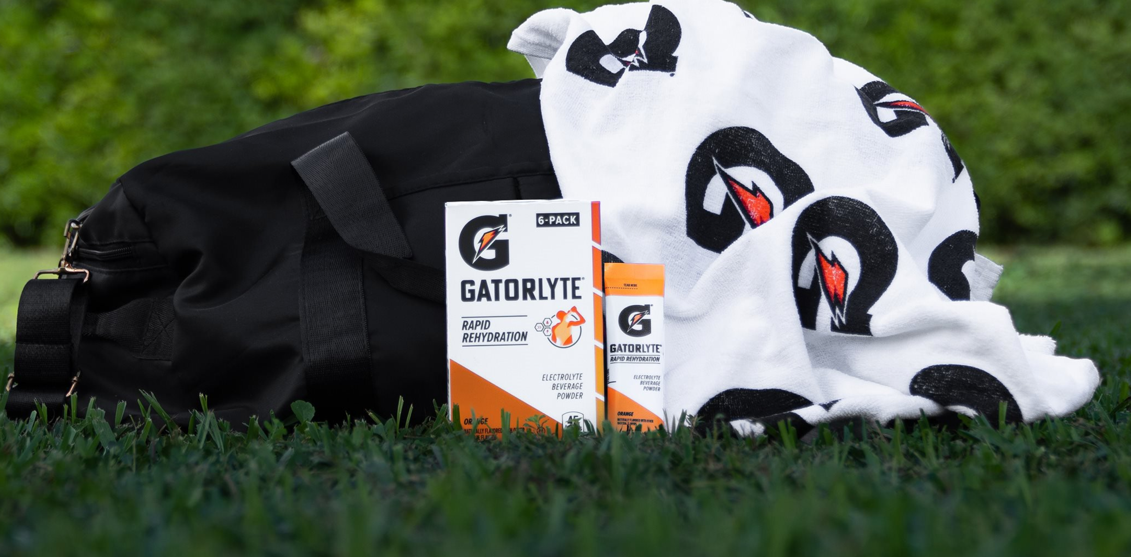 Gatorlyte Orange 6 pack with Gatorade towel on the field