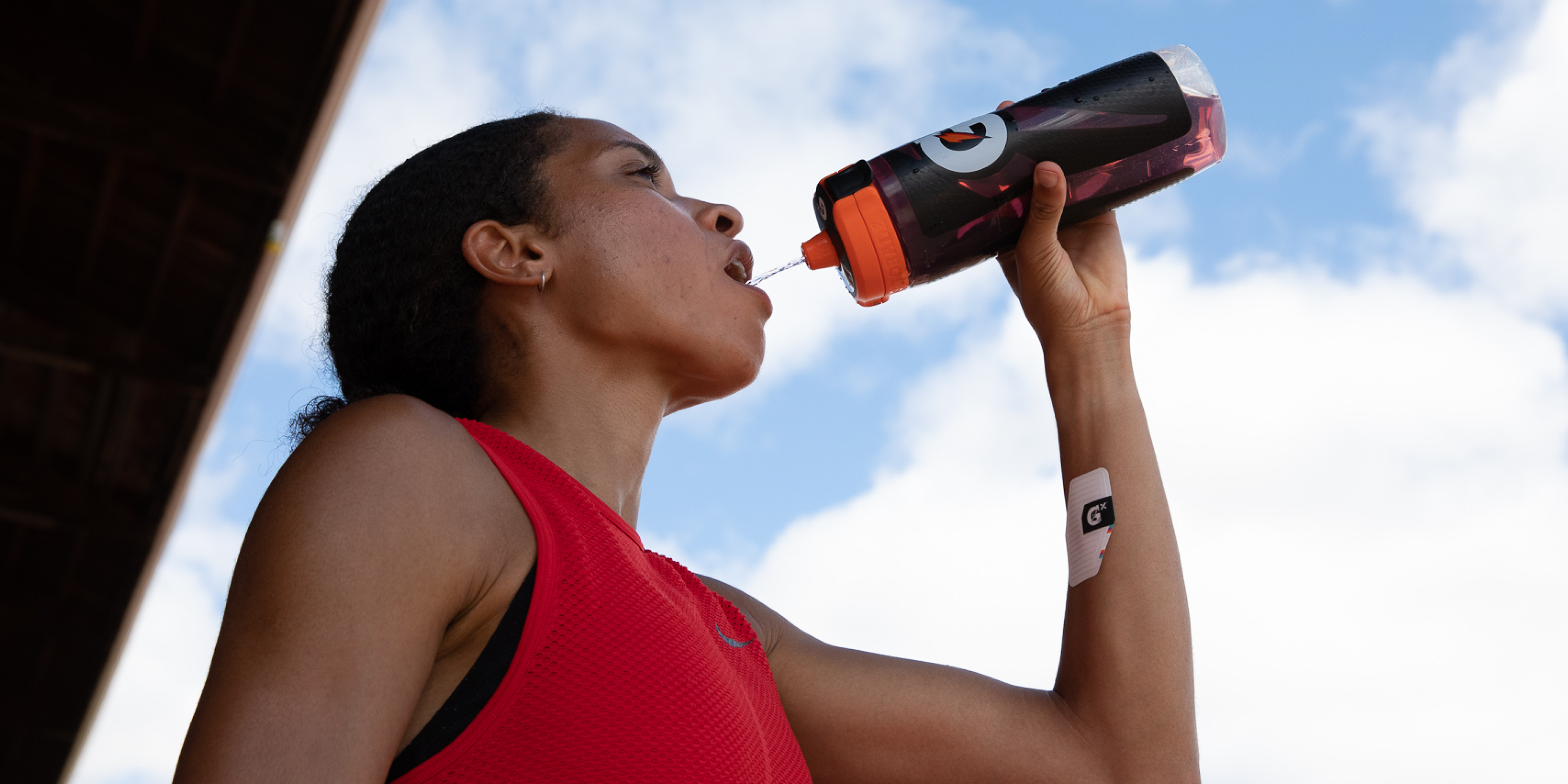 Athlete drinking Gatorade from a Gx Bottle