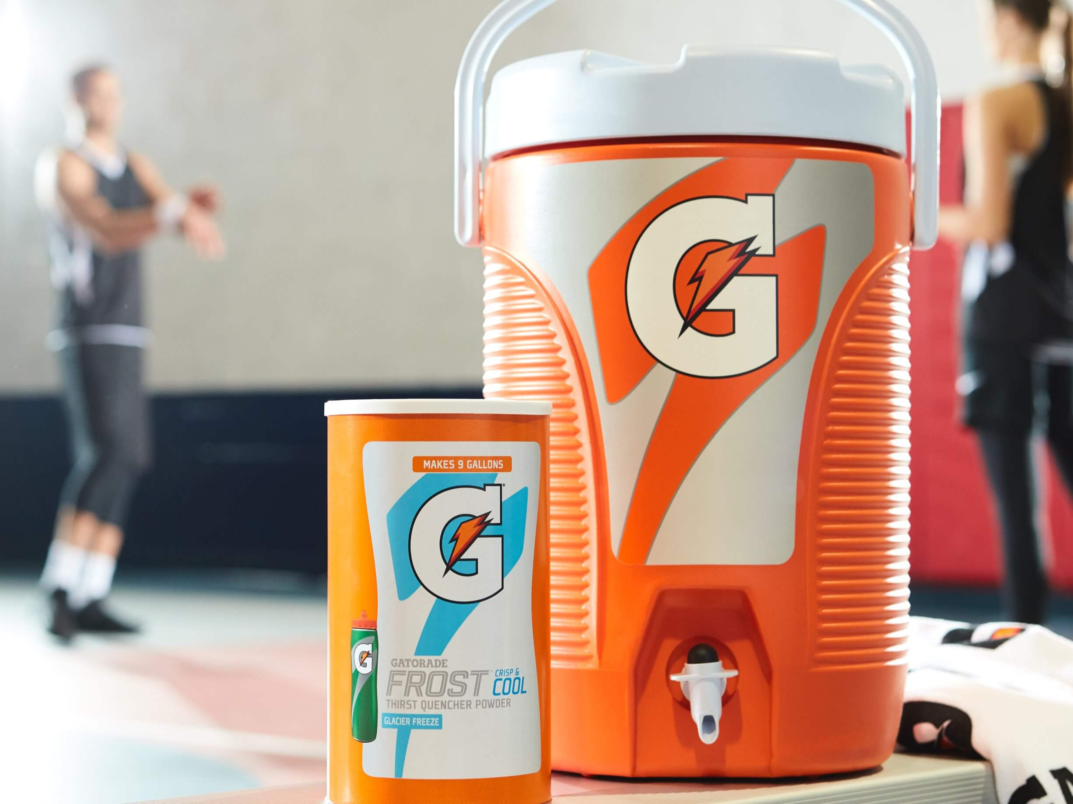 Gatorade Sideline Cooler next to a canister of Gatorade Powder