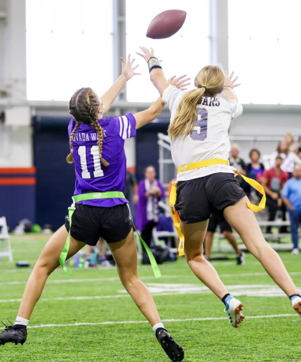 Female athletes playing football