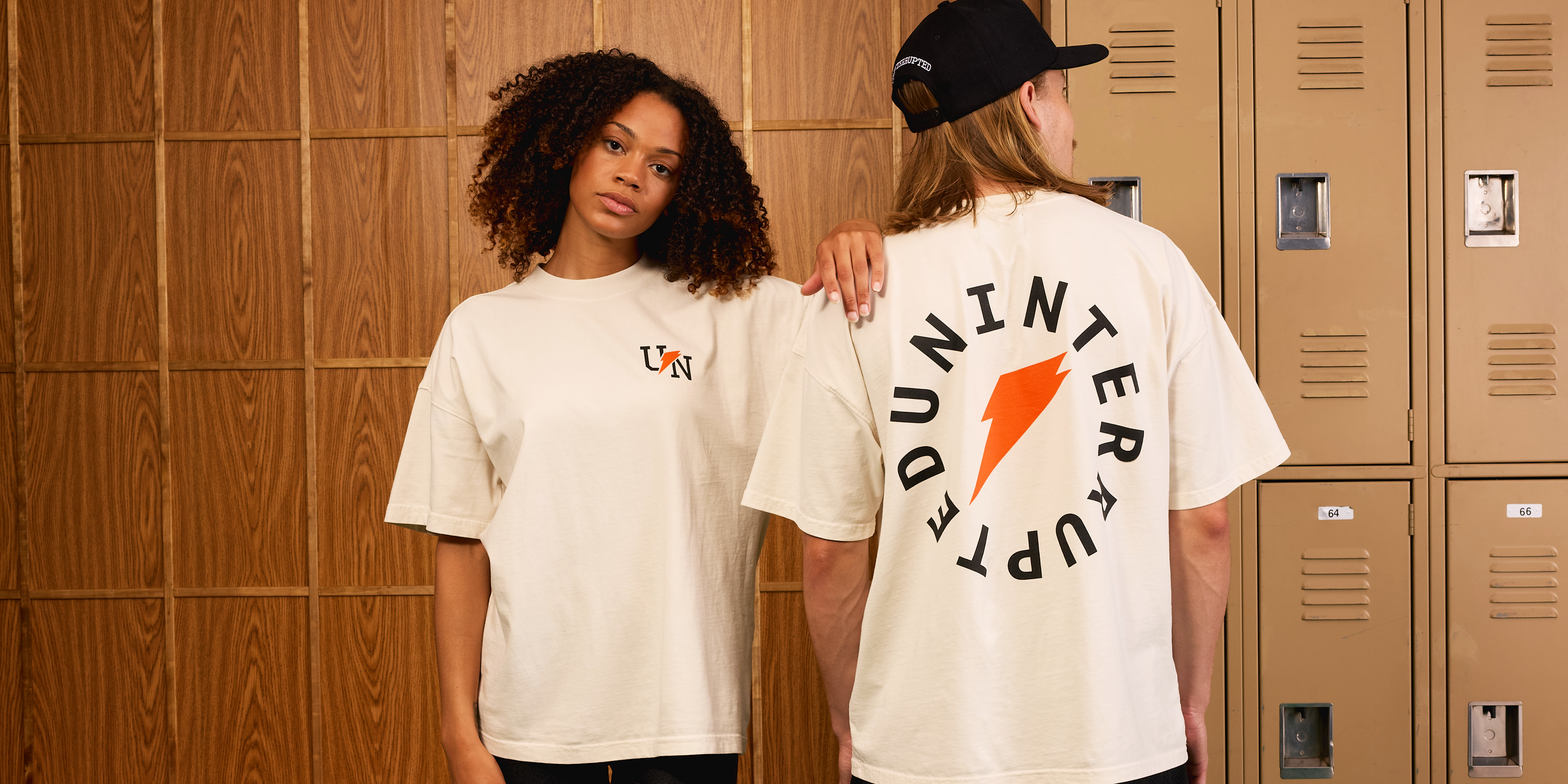Man and woman wearing the Gatorade x UNINTERRUPTED T-Shirt