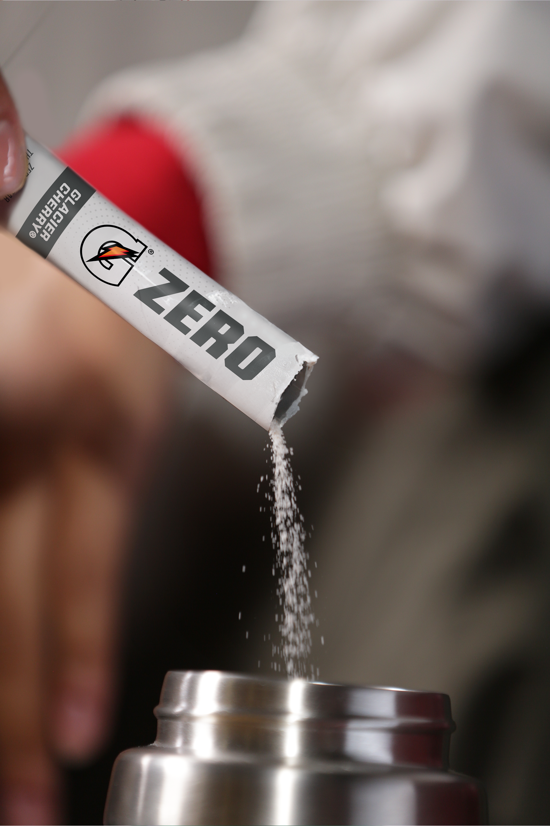 gatorade zero glacier cherry powder packet poured into bottle