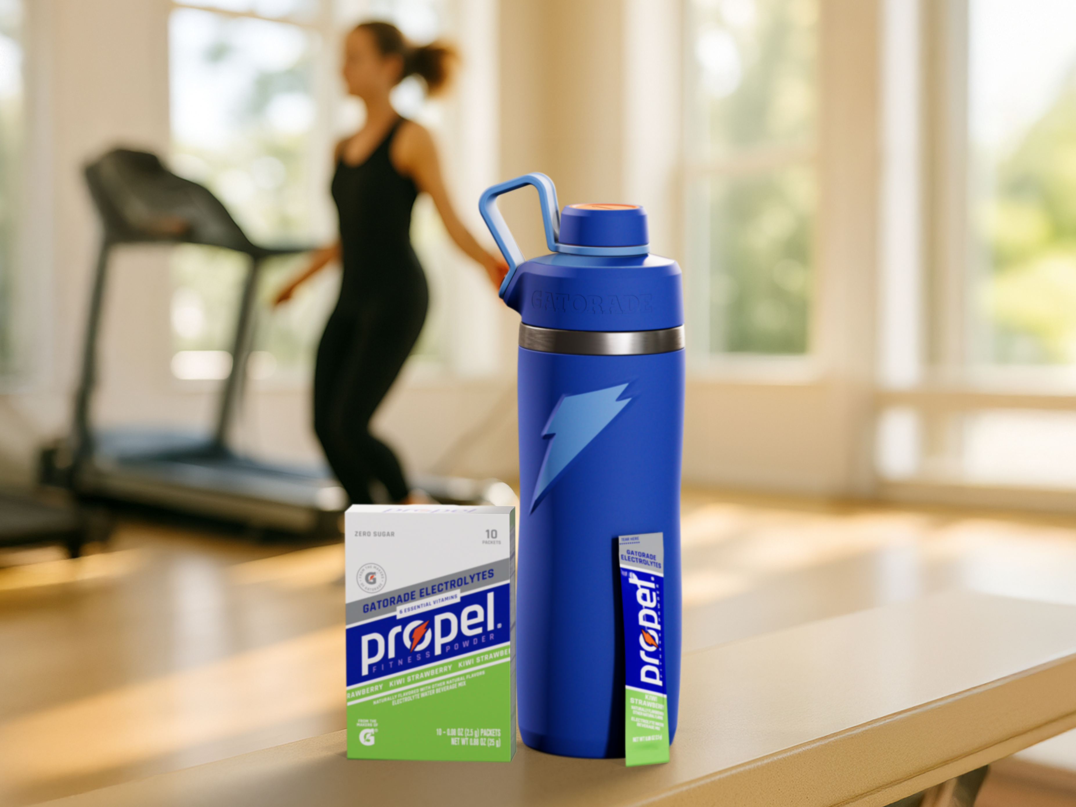 Propel kiwi strawberry with overtime bottle in front of athlete