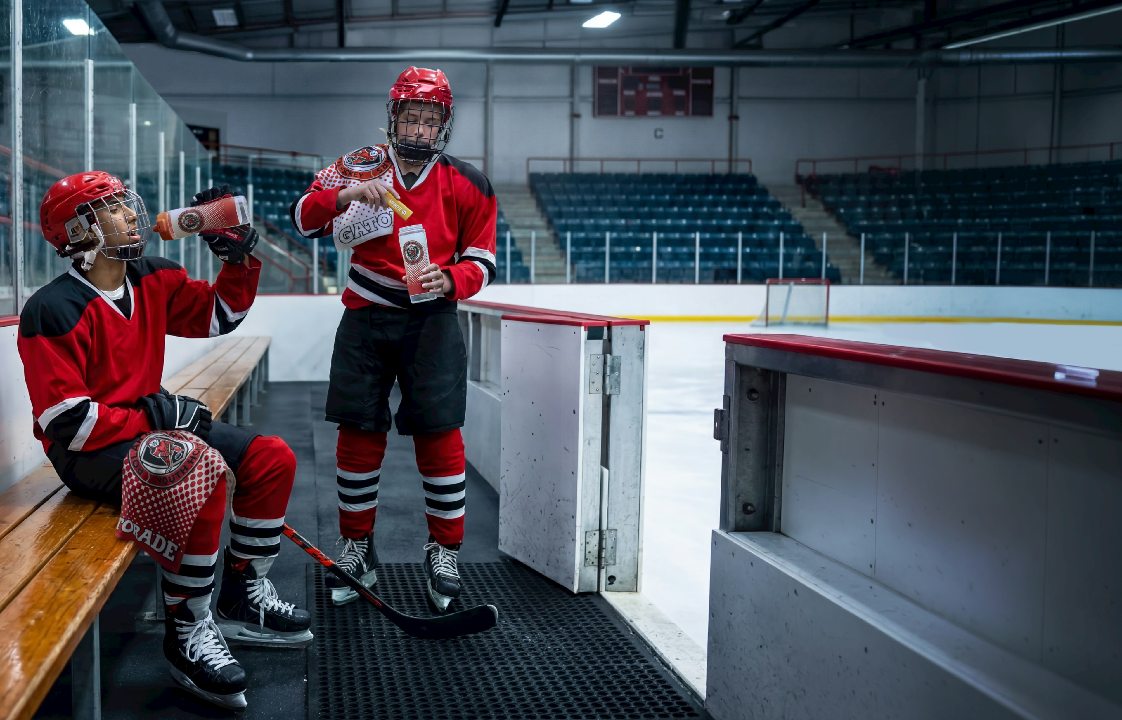 Hockey players with Gatorade towels, Gatorade squeeze bottles and Gatorade powder