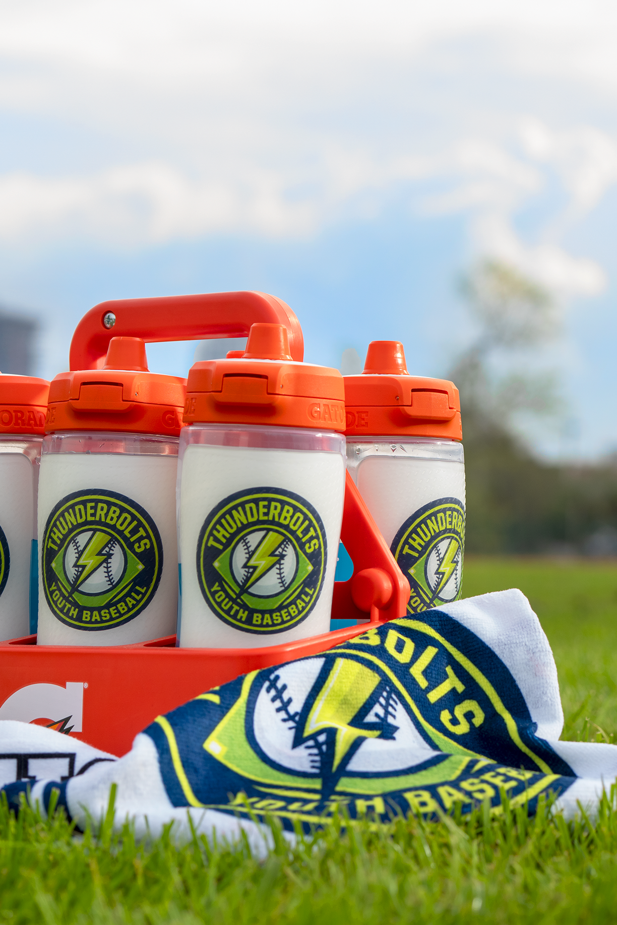 custom bottles and towels on field