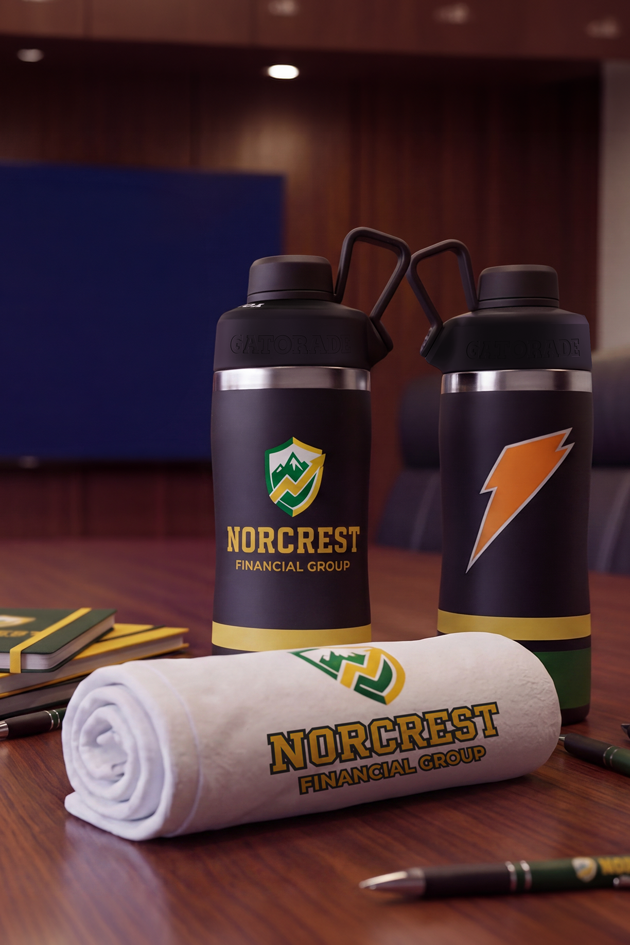 custom bottles and towel on a conference room table