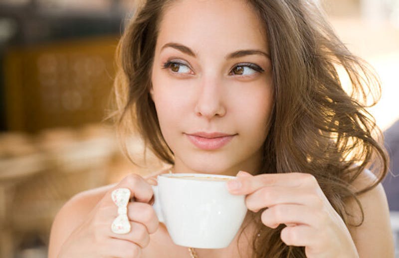 woman drinking coffee
