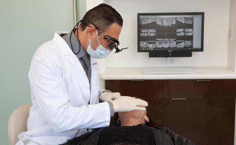 dentist examining patient