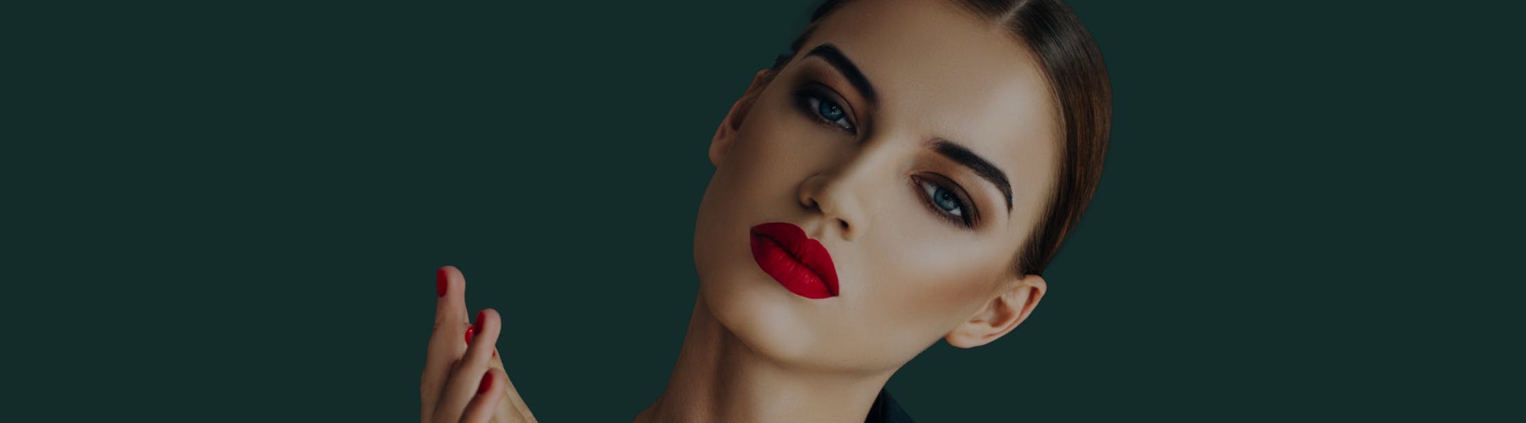 Glamorous woman withi red lips and dark eyebrows