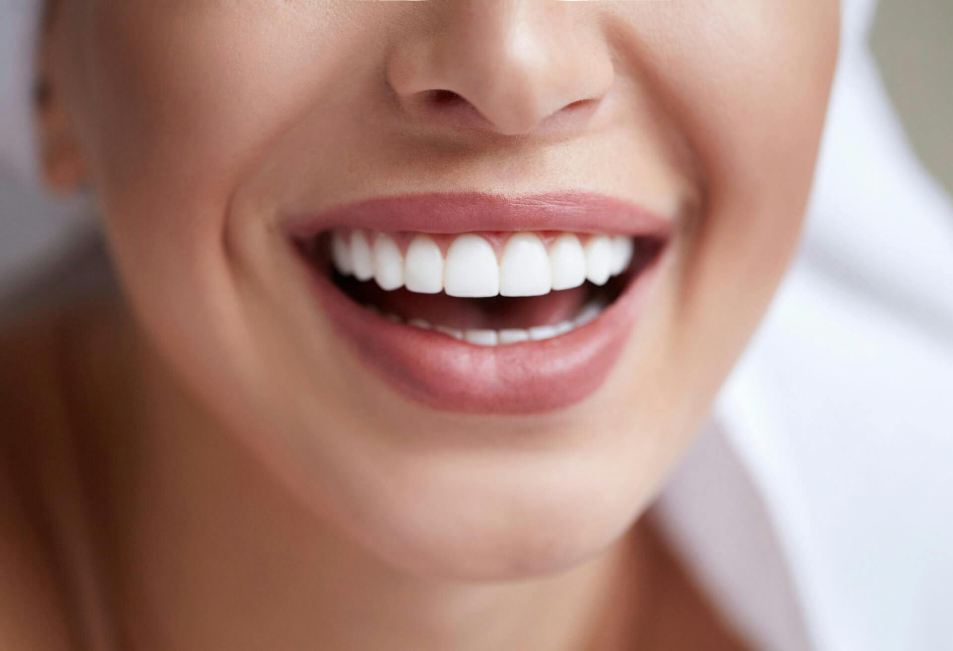 Woman's mouth smiling with perfect white teeth