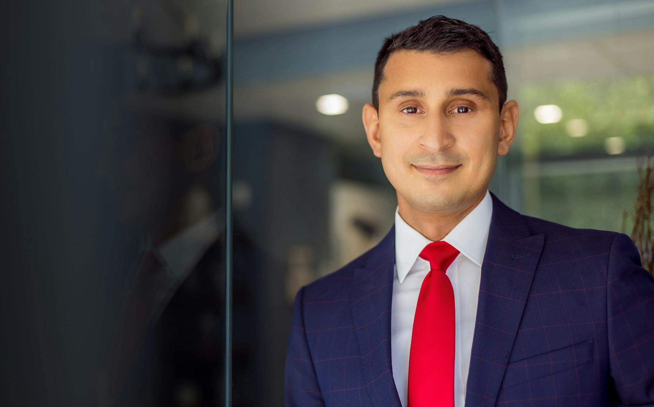 Dr. Omar Shakir smiling