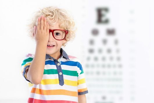 child taking eye test