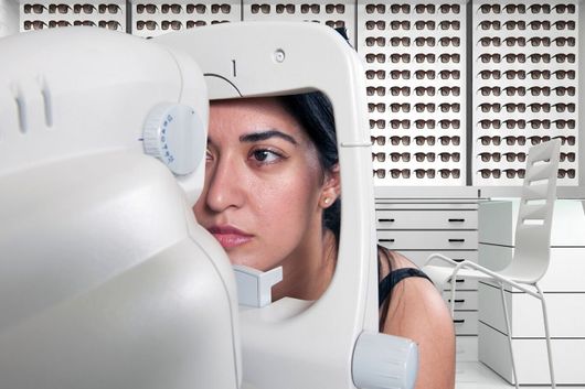 Woman undergoing eye exam