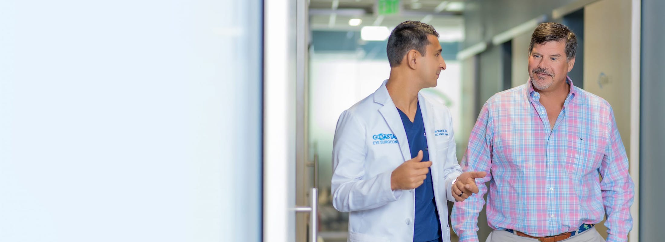 Dr. Omar Shakir speaking with patient