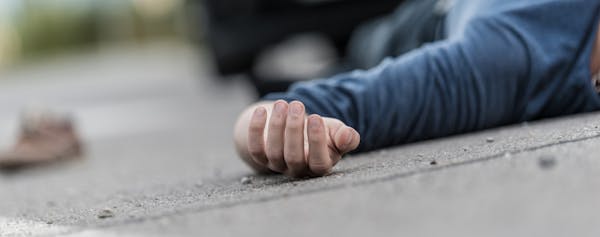 Man Injured on Floor - Pedestrian Accident Banner