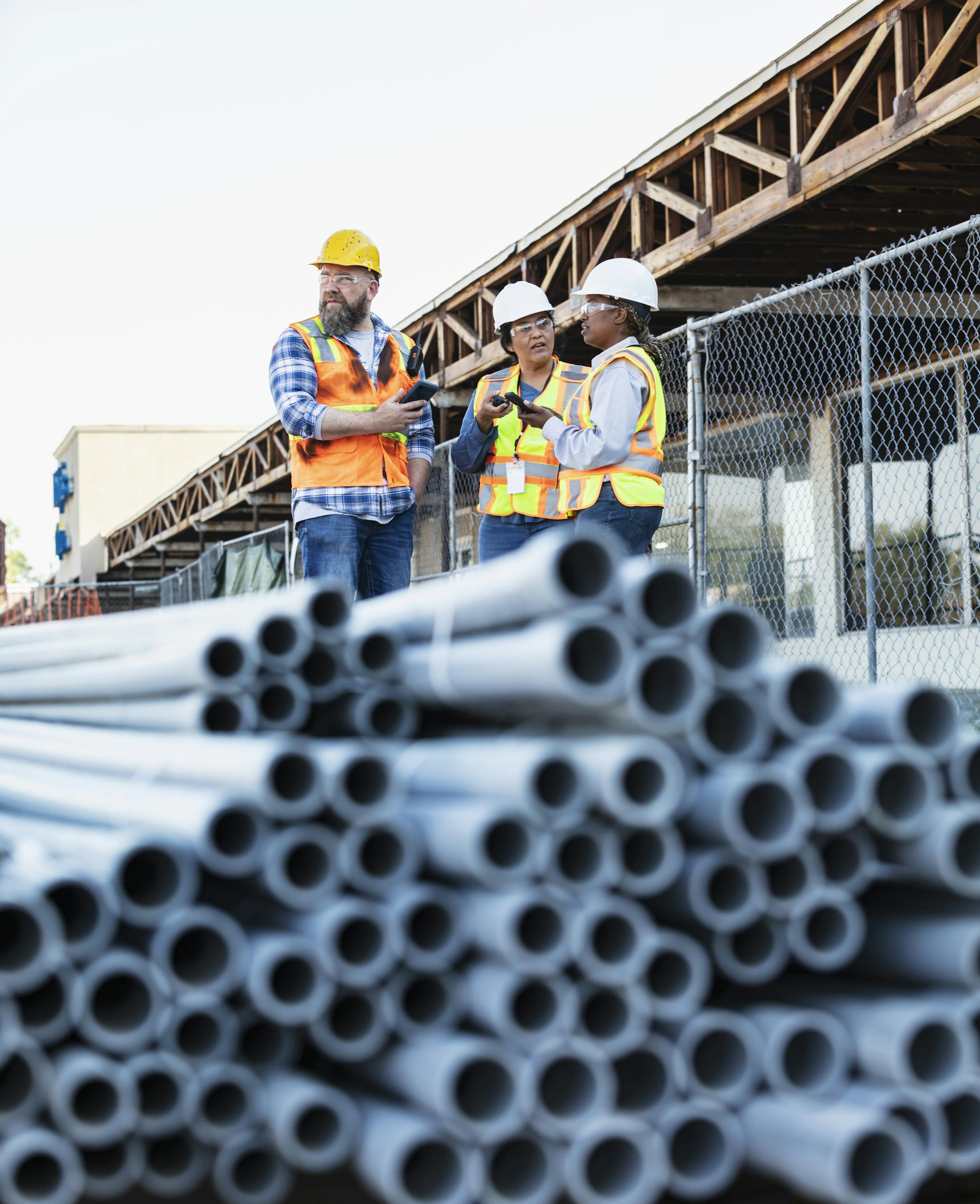 Workers talking at a construction site