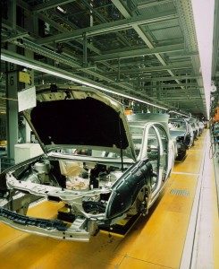 A damaged car that is being repaired