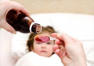 Child receiving medication