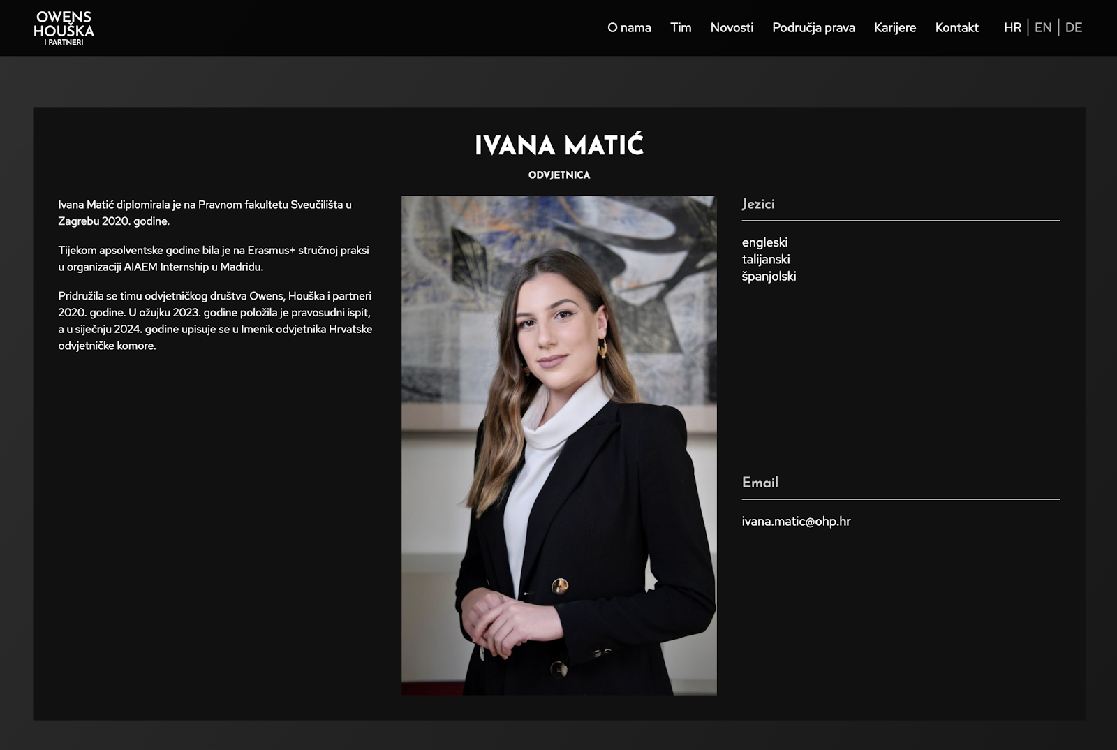 A team member's profile page, with her photo, the languages she speaks and her email.