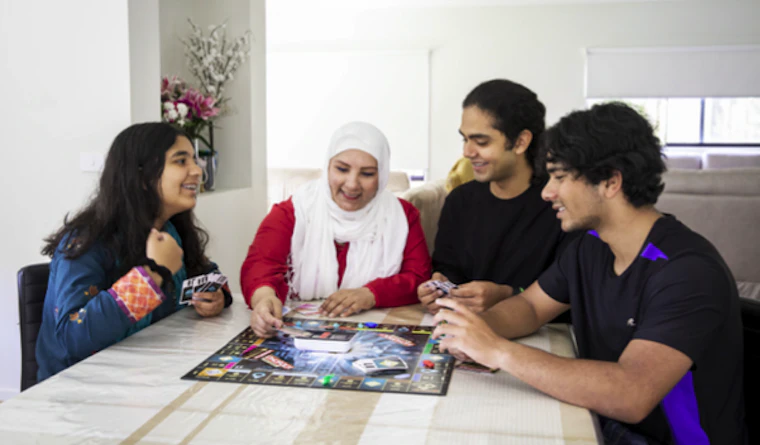 Friends playing boardgame