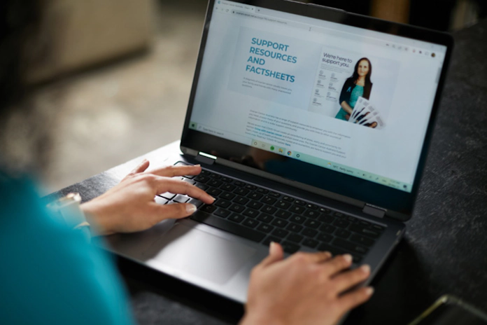 Woman looking at laptop