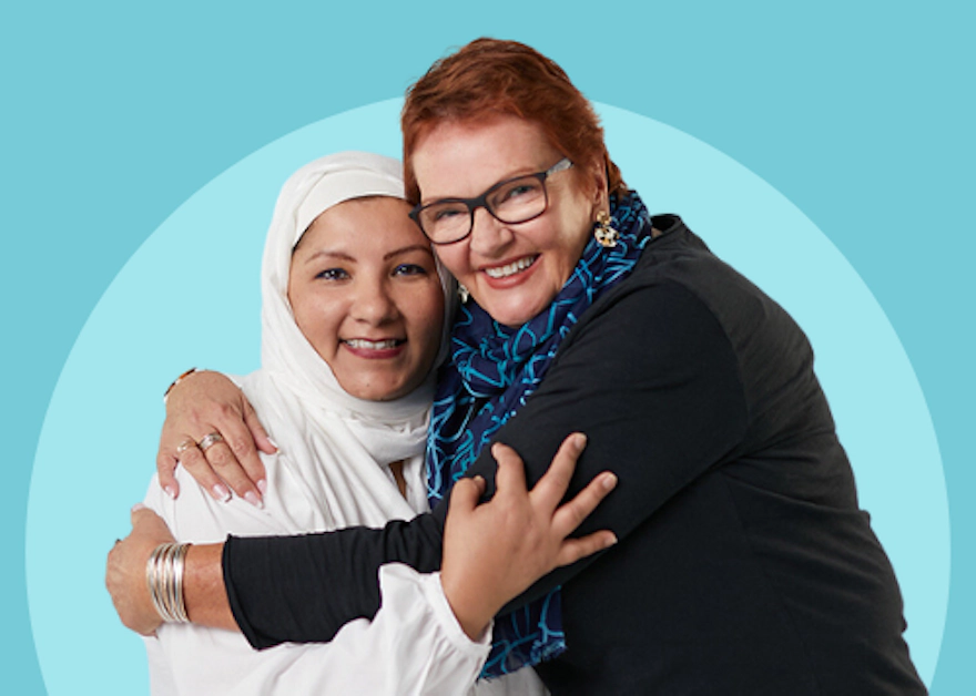 two women with ovarian cancer together smiling