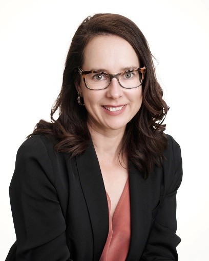 Portrait photo of Anna Boltong smiling into the camera