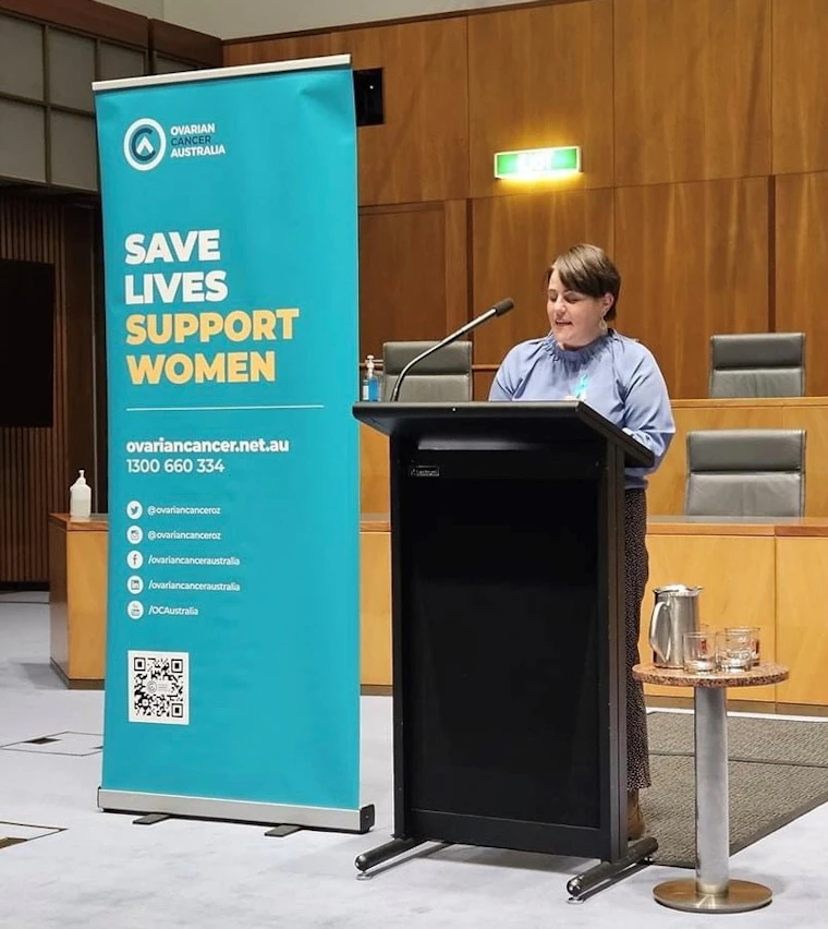 Renata presenting a speech as part of Gynaecological Cancer Awareness Month