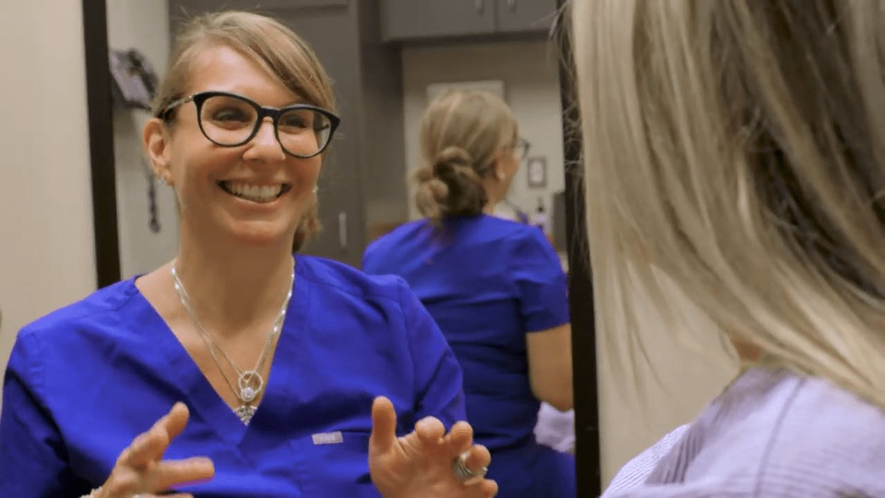 Dr. Shermak with a patient