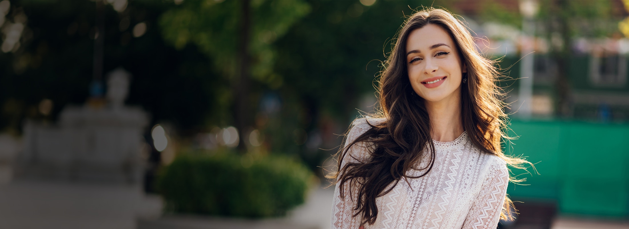 smiling brunette in a sweater