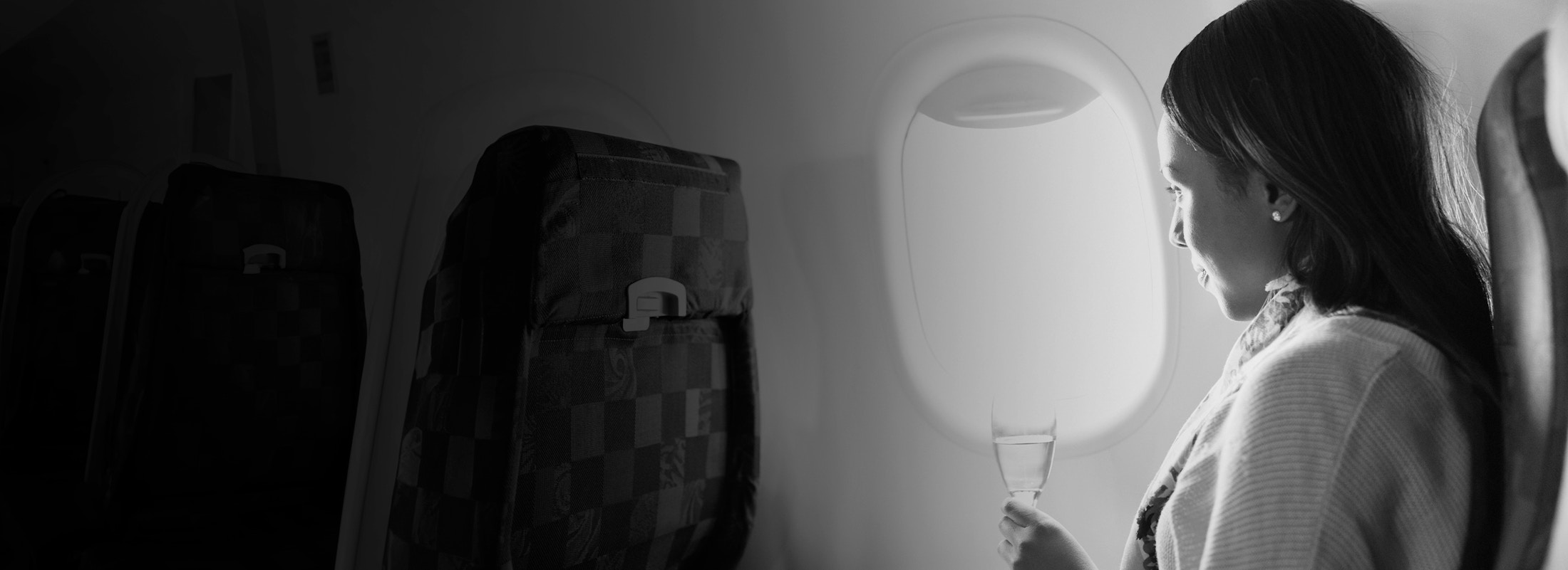 woman sitting on a plane
