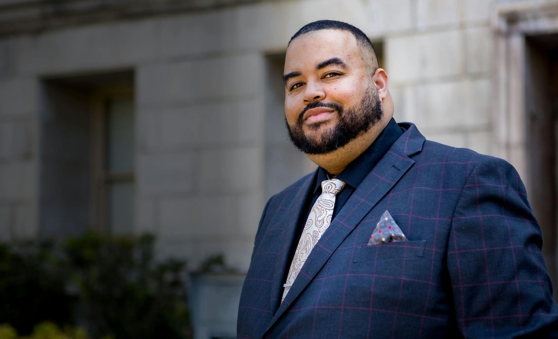 Vincent Hughes outside his office