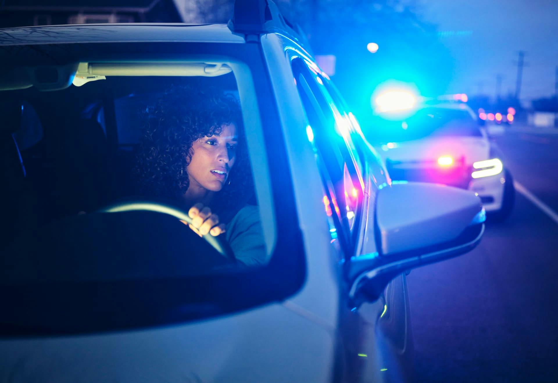 Woman getting pulled over.