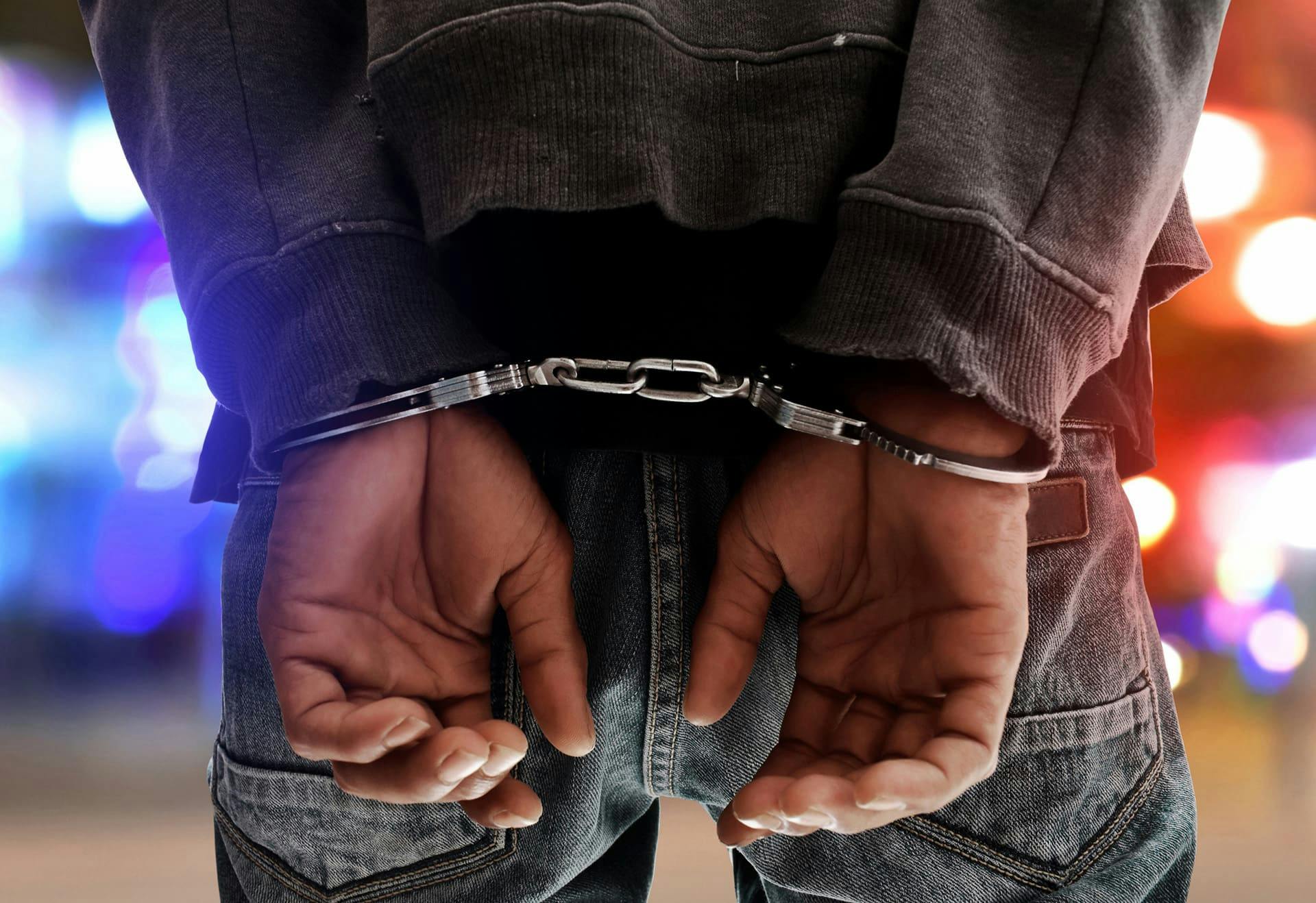 Man in handcuffs.