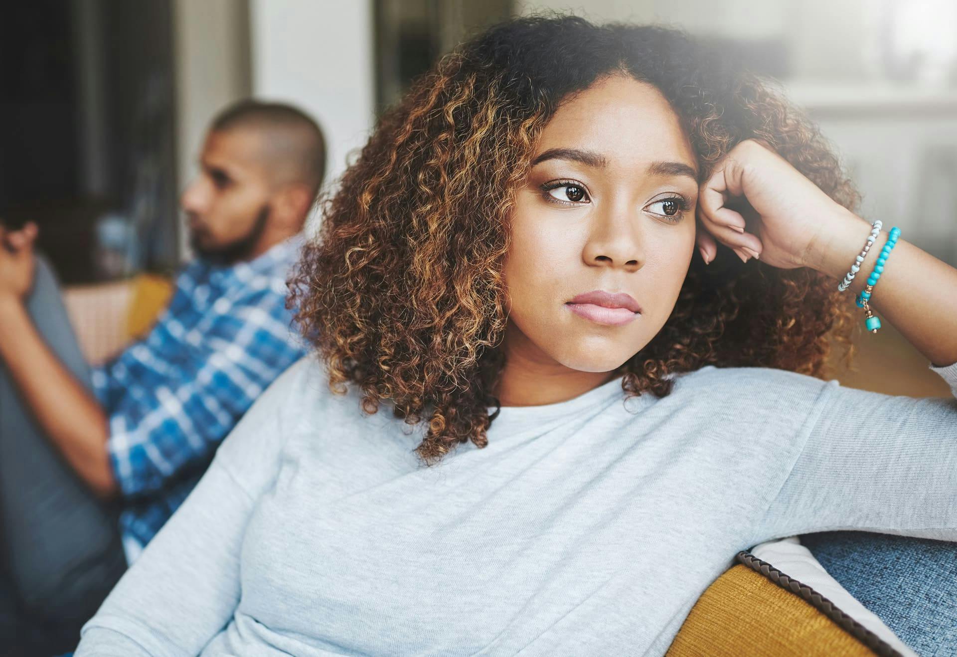 Woman looking away from her spouse
