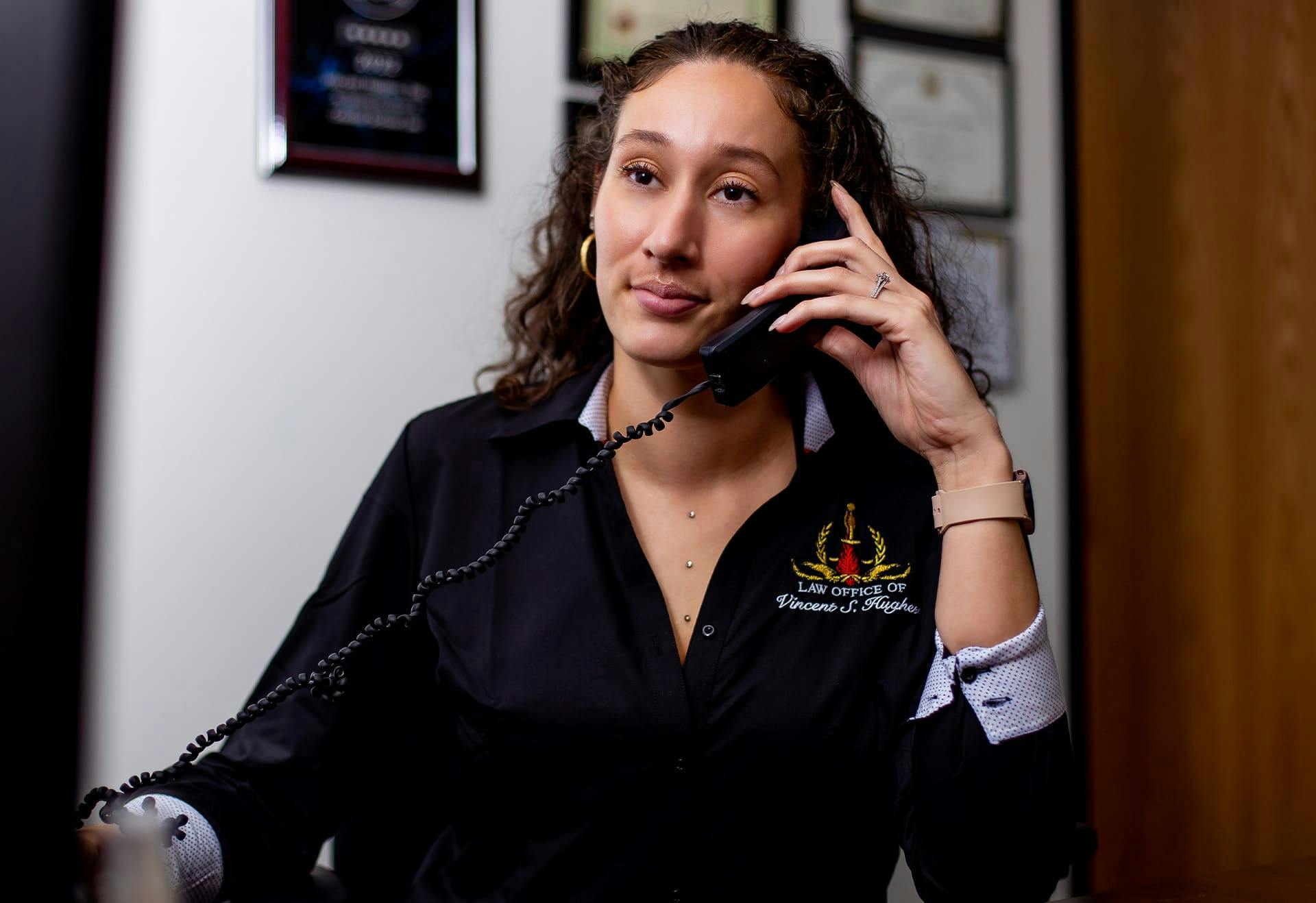 Staff of the Law Office on the phone.