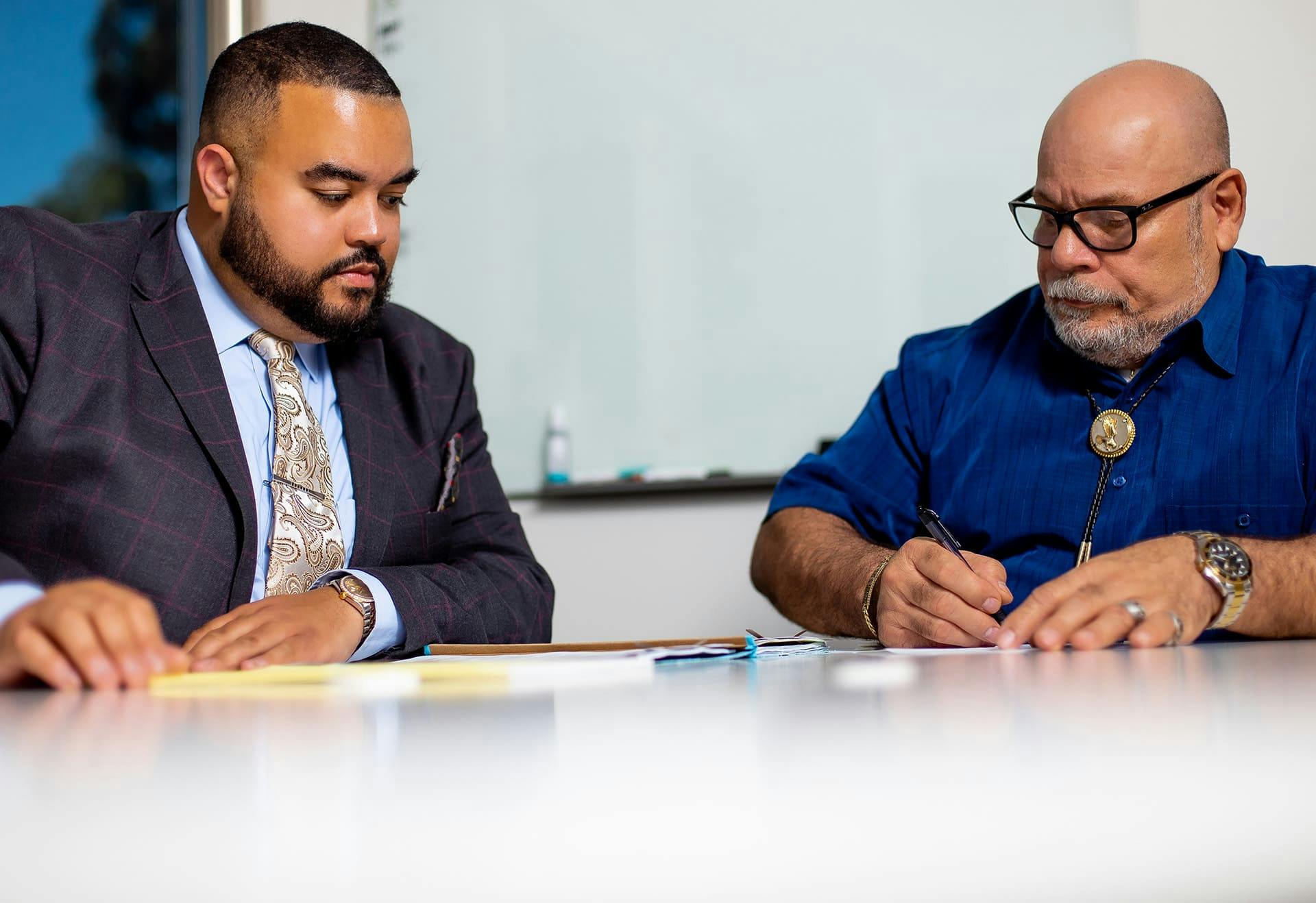 Vincent Hughes working with his client.
