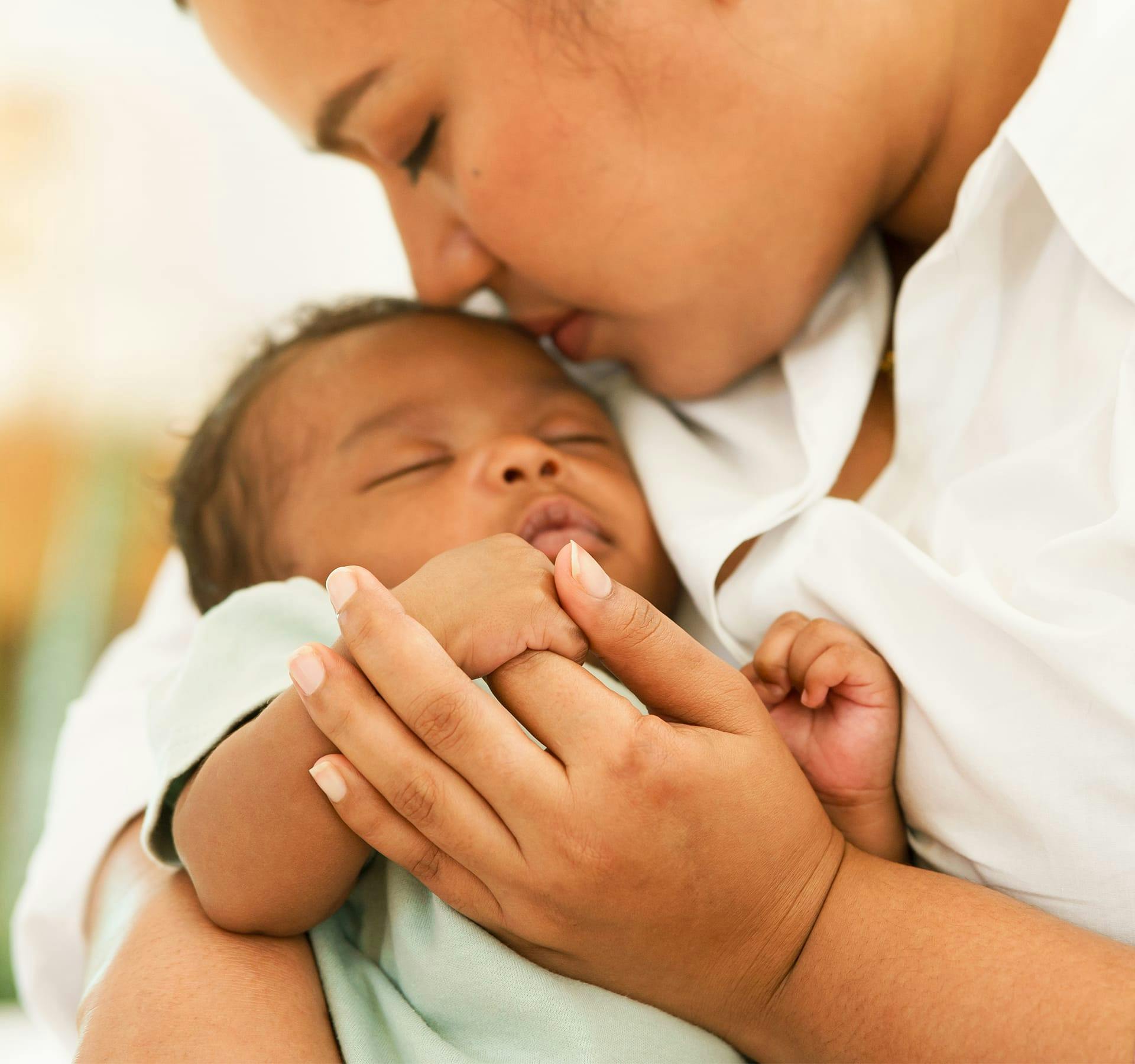 Woman holding a baby