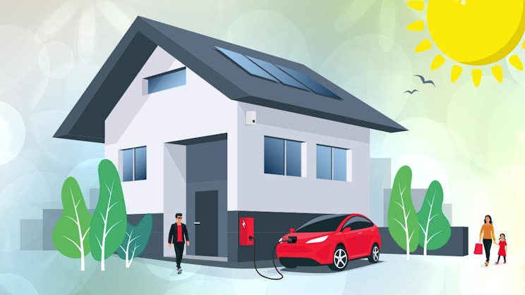 punainen auto on pysäköity talon eteen